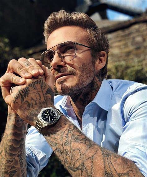 Male celebrities with tattoos .